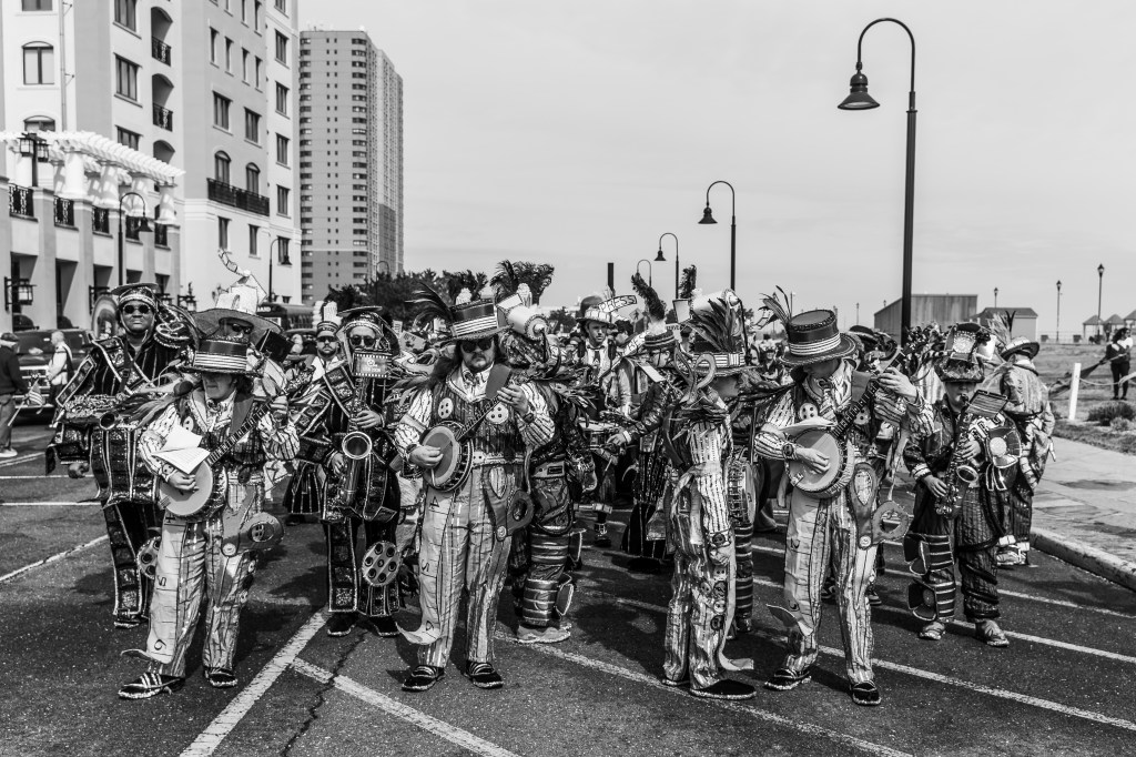 Asbury Park St Patrick's Day Parade bagpipers marching
Crowd celebrating St Patrick's Day parade Asbury Park NJ
Children waving flags at Asbury Park parade