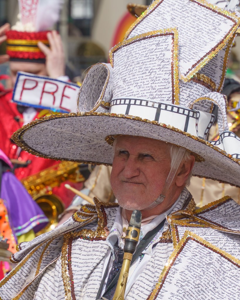 Asbury Park St Patrick's Day Parade bagpipers marching
Crowd celebrating St Patrick's Day parade Asbury Park NJ
Children waving flags at Asbury Park parade