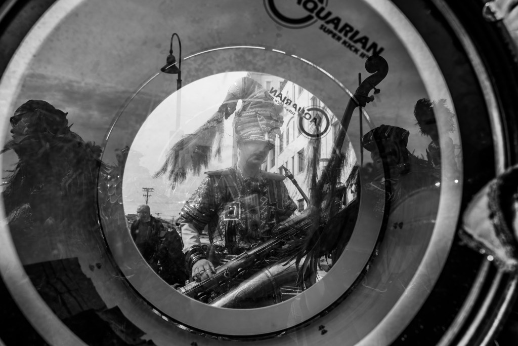 Asbury Park St Patrick's Day Parade bagpipers marching
Crowd celebrating St Patrick's Day parade Asbury Park NJ
Children waving flags at Asbury Park parade
