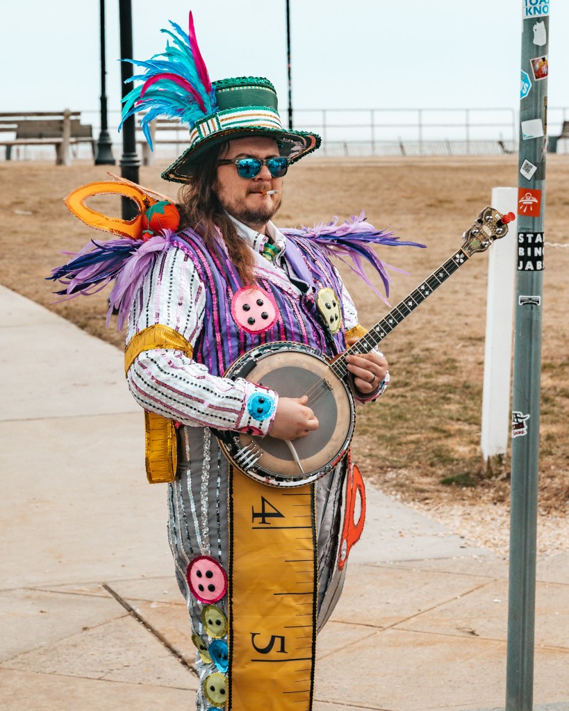 Asbury Park St Patrick's Day Parade bagpipers marching
Crowd celebrating St Patrick's Day parade Asbury Park NJ
Children waving flags at Asbury Park parade